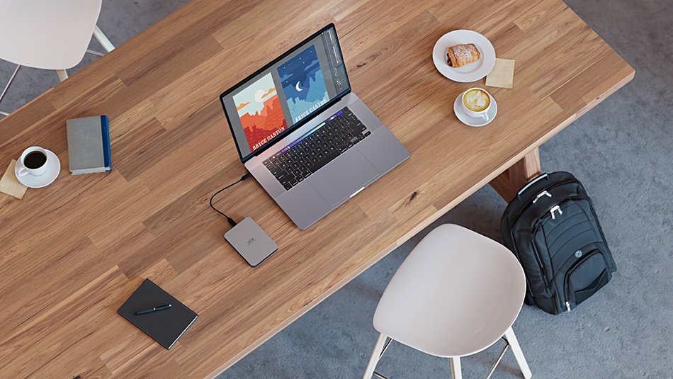 LaCie mobile storage hooked up to a notebook