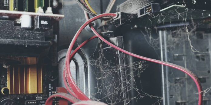legacy tech old infrastructure untended to legacy kit covered in cobwebs